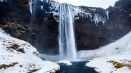 Cinemagraph Of Beautiful Waterfall In Iceland With Ice And Snow Stock Footage