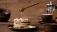 Cinemagraph - Breakfast, Pouring Honey On Pancakes. Stock Footage