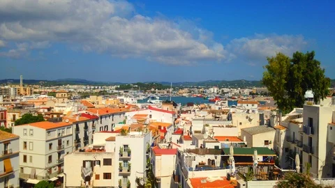 Cinemagraph - Clouds floating over the port of the Town of Ibiza on Ibiza Island Stock Footage 100792751