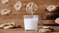 Cinemagraph - Cookie Falls Into The Glass Of Milk. Nobody. Stock Footage