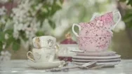 Cinemagraph - Cups Of Tea On The Wooden Table Under The Rain . Stock Footage