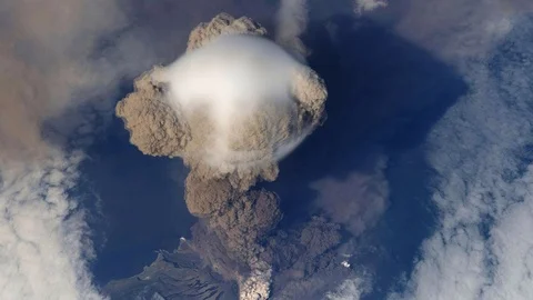 Cinemagraph of exploding volcano in mountain aerial Stock Footage 114085724