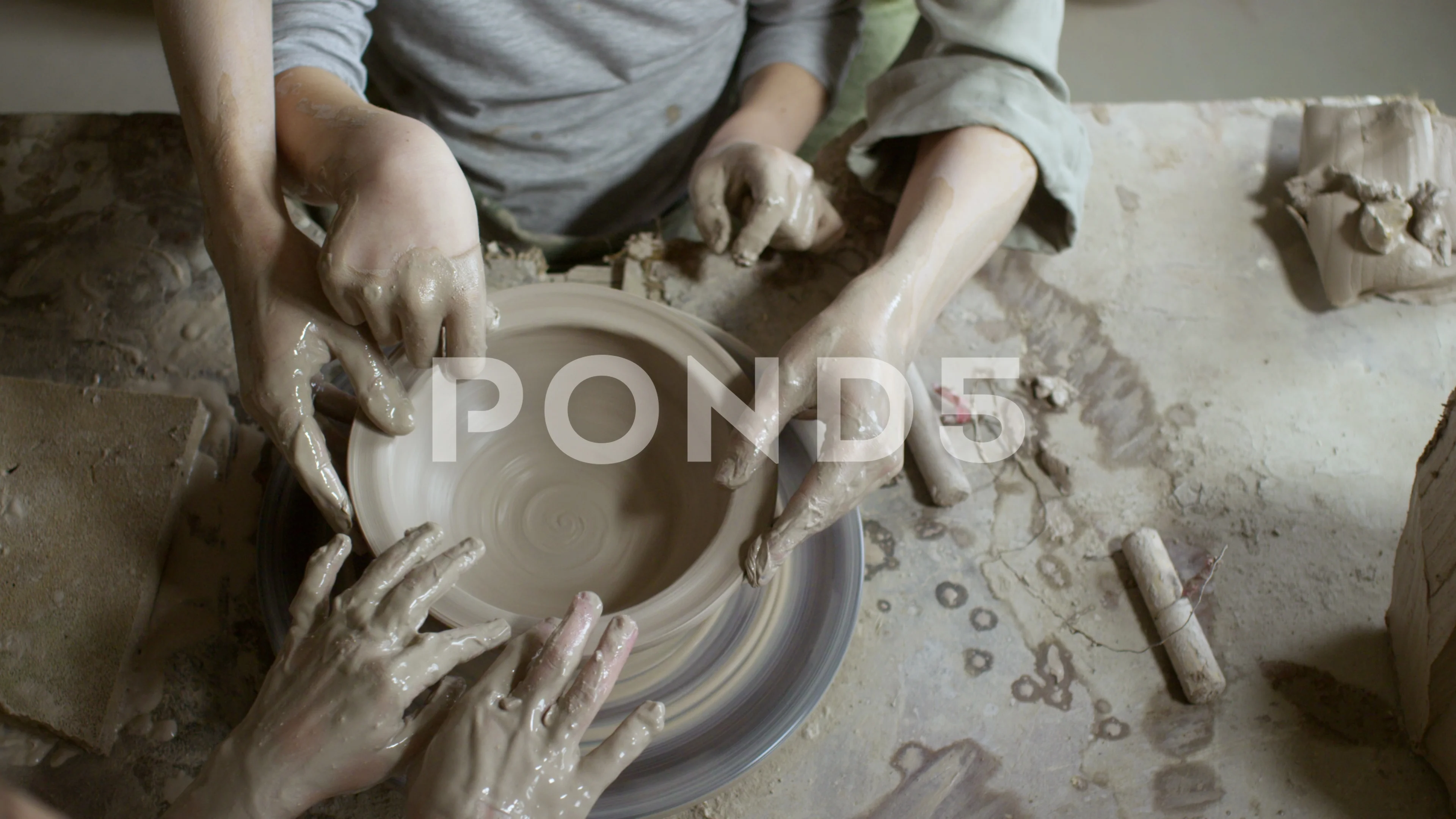 Potter molding clay on a potters wheel, Stock Video