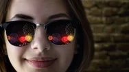 Cinemagraph - Firework Reflected In Young Beautiful Girl's Sunglasses. Stock Footage