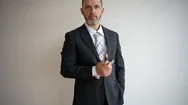 Cinemagraph Of Handsome Businessman Standing With A Lighter In His Hands Stock Footage