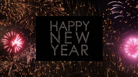 Cinemagraph of happy new year text in silver glitter on black over exploding Vídeos de archivo 258551102