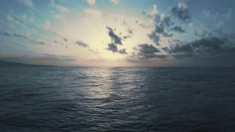 Cinemagraph loop of aerial dramatic sunrise on the sea Video stock 142494567