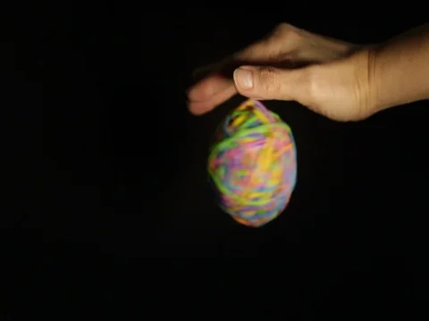 Cinemagraph loop ball turning hand closeup back background Stock Footage 82410087