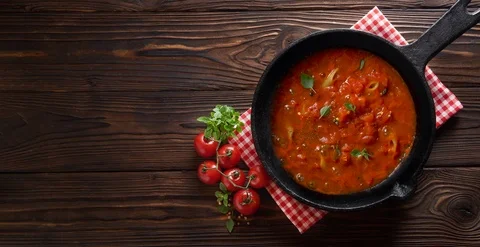 Cinemagraph loop. Cooking pasta penne with tomato sauce and basil on iron cast Stock Footage 108203015
