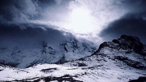 Cinemagraph Loop - Timalapse of Clouds over Peak - motion photo Stock Footage 98753884