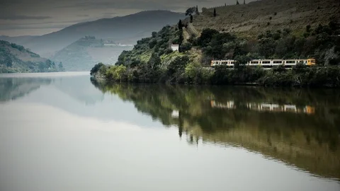 Cinemagraph Loop - Train Along River - motion photo Stock Footage 98711009