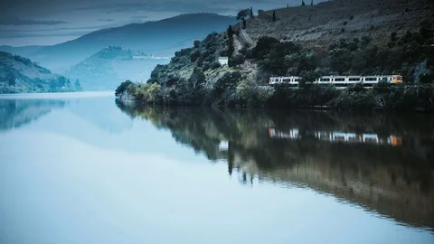 Cinemagraph Loop - Train Along River - m... | Stock Video | Pond5