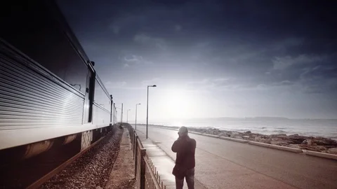 Cinemagraph Loop - Train by the Beach at Sunrise - motion photo Stock Footage 98713226