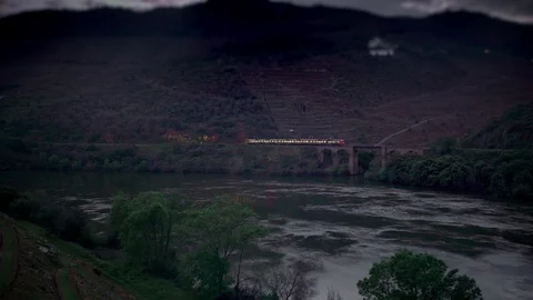 Cinemagraph Loop - Train Reflection in water at night - motion photo Stock Footage 98711014
