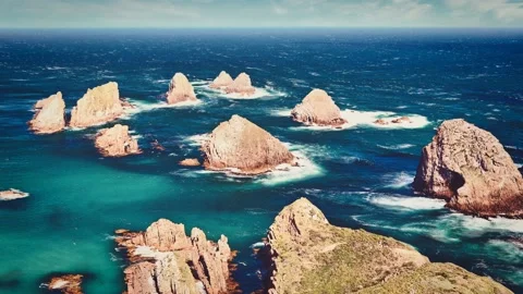 Cinemagraph loop of vibrant moving sea and several scenic rocks formation Stock Footage 151792725