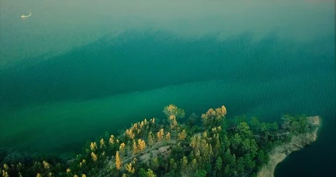 Cinemagraph Loop - Wind through the Trees at the Lake - motion photo  Stock Footage 98711144