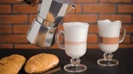 Cinemagraph, Making Latte Macchiato, Coffee Pouring From Moka Pot Into Glass Stock Footage