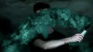 Cinemagraph Of Man Holding Smoke Canister Stock Footage