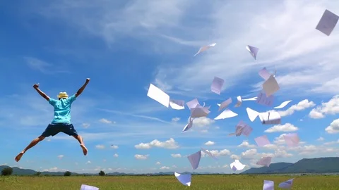Cinemagraph of a man jumping and cloud sky time lapse. Stock Footage 108778627