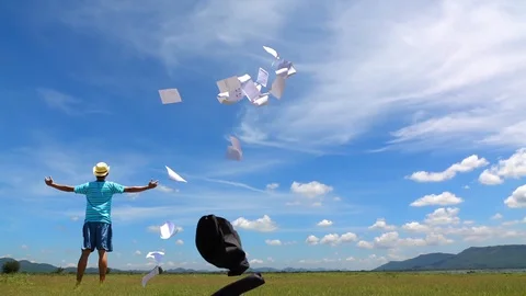 Cinemagraph of a man jumping and cloud sky time lapse. Stock Footage 108779640