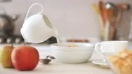 Cinemagraph - Milk Pouring Into Cereal Bowl. Stock Footage