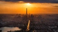 Cinemagraph Of Moving Clouds And Water With City View At Sunset Stock Footage
