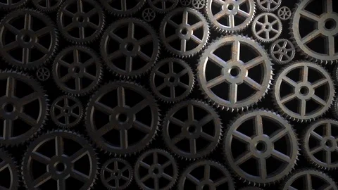 Cinemagraph of one gear going forward and backward amongst many other Video stock 107894336