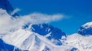 Cinemagraph Paragliding In Switzerland Over Alps During Winter Stock Footage
