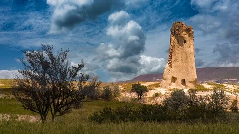 Cinemagraph parallax effect of time lapse clouds flowing into the scene Stock Footage 109669805