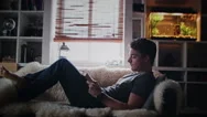 Cinemagraph (Photo-Motion) Of A Young Relax Adult Reading A Book Stock Footage