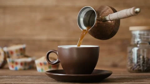 Cinemagraph - Pouring coffee into a cup . Stock Footage 87321373