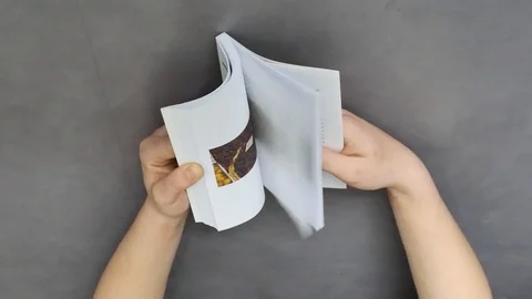 Cinemagraph - reading a book Stock Footage 90310663