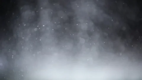 Cinemagraph of round water bokeh texture on a black background. Copy text Stock Footage 133224865