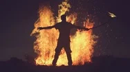 Cinemagraph Silhouette Of Man Standing In Front Of Bonfire Stock Footage