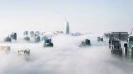 Cinemagraph Of Skyscrapers Above The Clouds In Hong Kong With Clouds Rolling Stock Footage