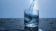 Cinemagraph Slow Motion Of Water Being Poured In Glass Stock Footage