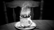 Cinemagraph Of Steaming Cup Of Coffee On Table Stock Footage