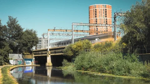 Cinemagraph of train stopped in motion with river moving Stock Footage 92642529