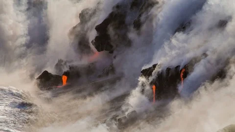 Cinemagraph of volcano erupting by ocean Stock Footage 100361322