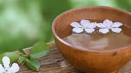 Cinemagraph - White Flowers In  Bowl On Old Wood,  Aroma Spa Concept. Stock Footage