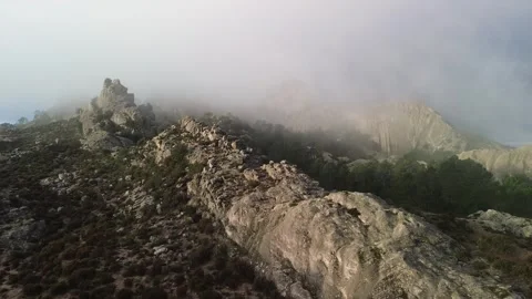 Cinematic 4k Drone Flight over Mountain Peaks with morning mist, Corsica Video stock 331667046