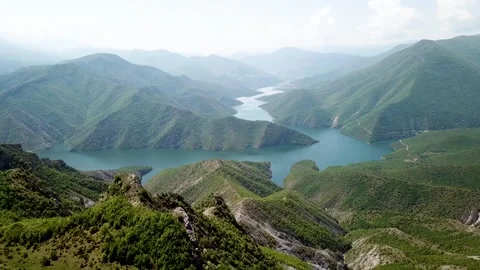 Cinematic 4K Drone Flight Over Mountain Lake and River Stunning Alpine 動画素材 335358041