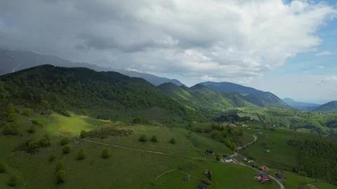 Cinematic 4K drone flight over mountain landscape in Romania Stock Footage 343852960