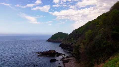 Cinematic 4K Drone Flight Through Tunnel Exit Towards Island and Sea Vídeos de archivo 334326053