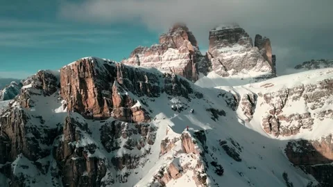Cinematic 4k drone footage of a scenic snowy landscape at sunset Stock Footage 285972053