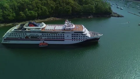 Cinematic 4K drone strafe along cruise liner in Fowey estuary Stock Footage 333933816