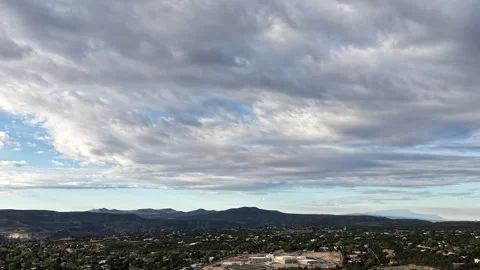 Cinematic 4K Drone Timelapse of Rolling Clouds over a Southwest Mountain Town Stock Footage 334565808