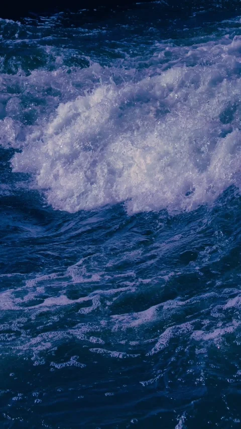 Cinematic 4K Ocean Wave Breaking with White Foam Vertical Slow Motion B-Roll Stock Footage 324619519