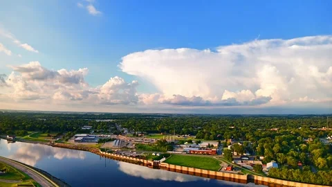 Cinematic 4K Time-Lapse Clouds Over River at Sunset Stock Footage 315245360