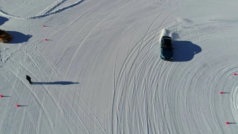 Cinematic Aerial of Car Testing Engine and Tyres in Winter Conditions and Video stock 112646105